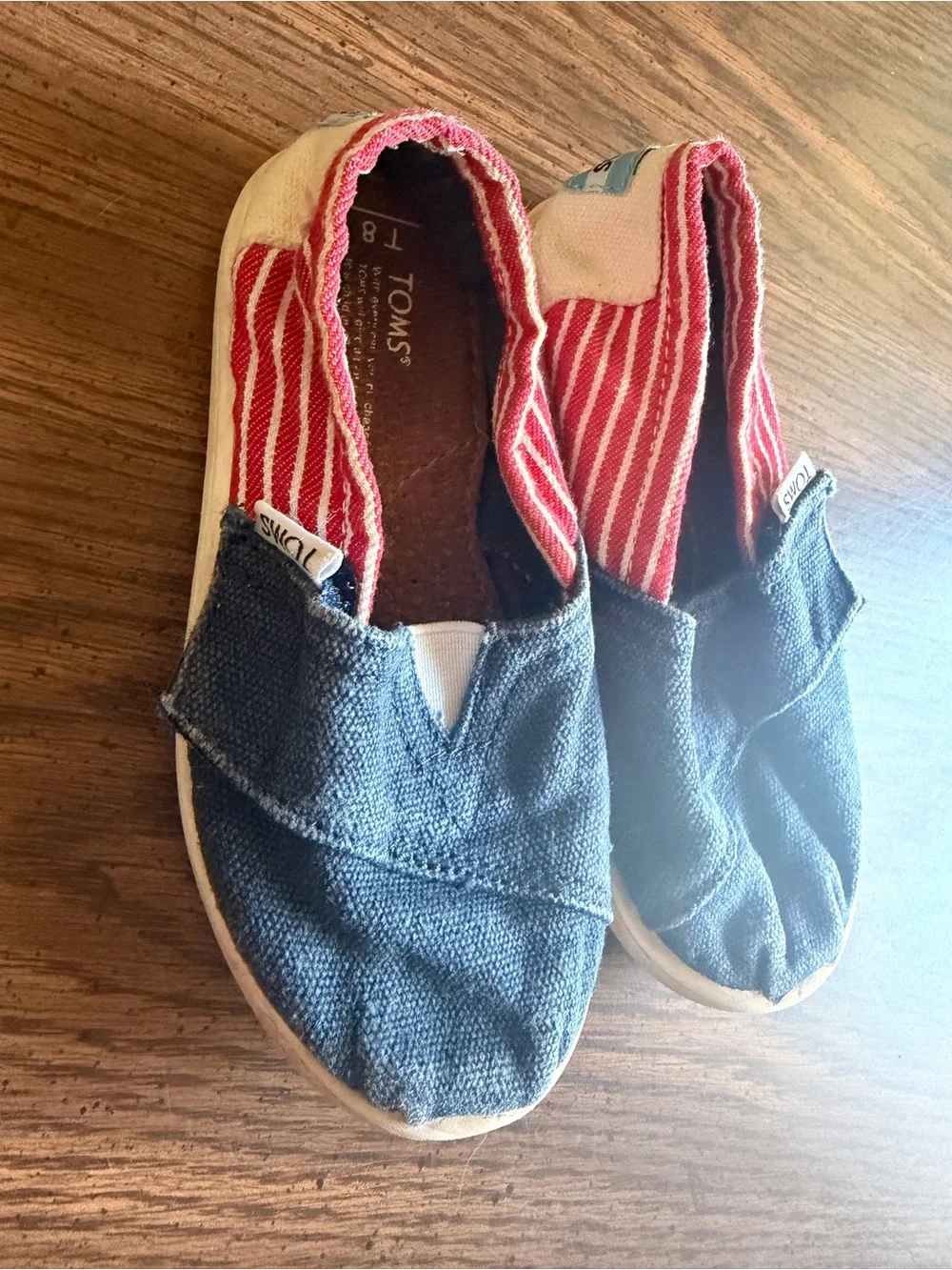 Toms Kids Slip-On Sneakers in Blue with Red Stripe Lining